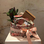 Load image into Gallery viewer, "Balance" Hamper in floral fabric storage basket with a plant