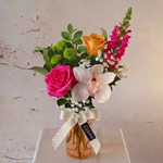 Load image into Gallery viewer, Vibrant posy with peach glass vase